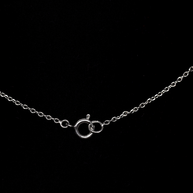 Collar de oro blanco de 18k con topacio y diamante