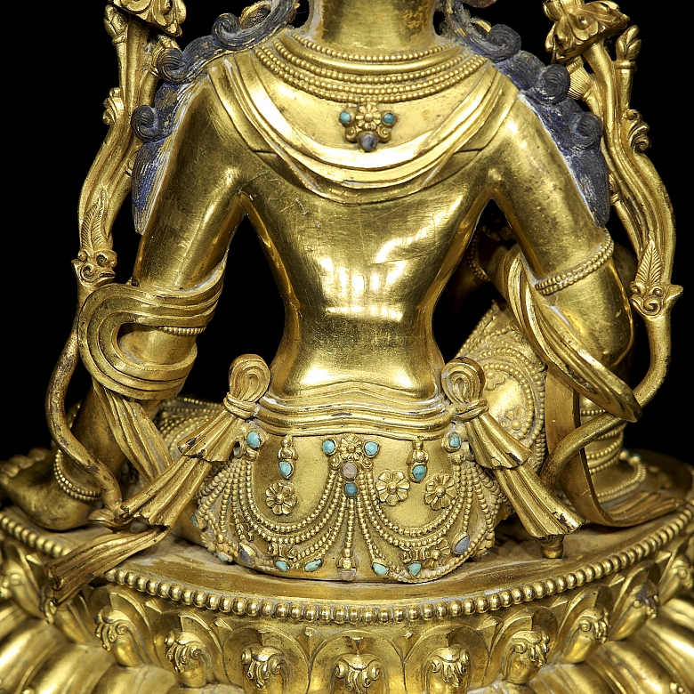 Figura de bronce dorado 