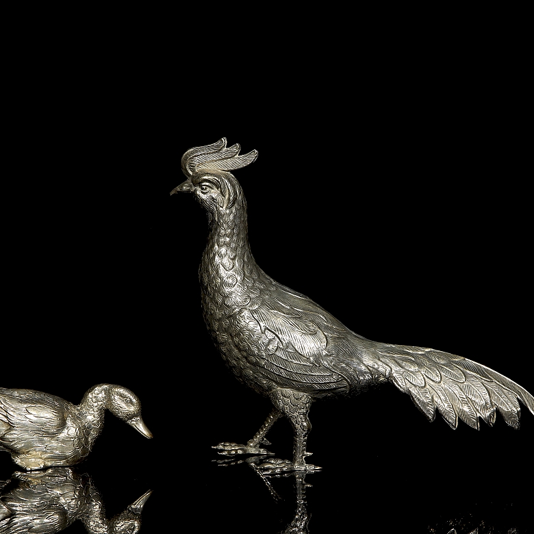 Dos figuras de plata 