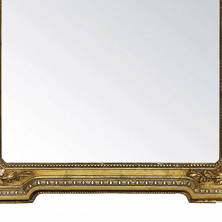 Espejo con marco de madera dorada, s.XX