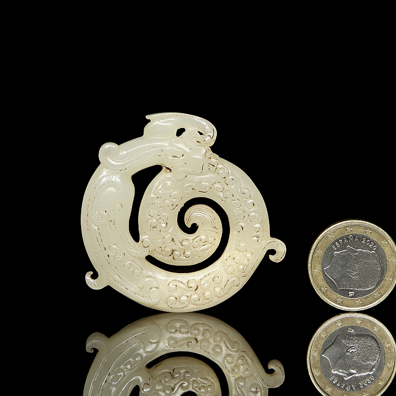 Carved white jade pendant “Dragon,” Han dynasty