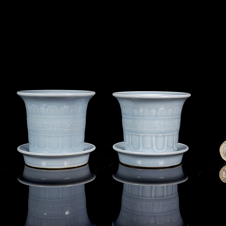 Pair of porcelain flower pots with sky blue glaze, marked Qianglong