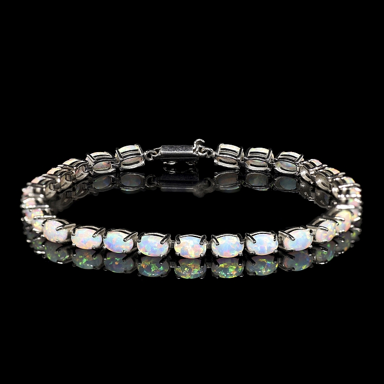 Pulsera de oro blanco con ópalos