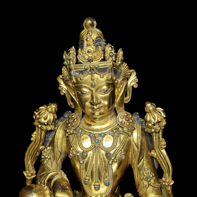 Figura de bronce dorado 