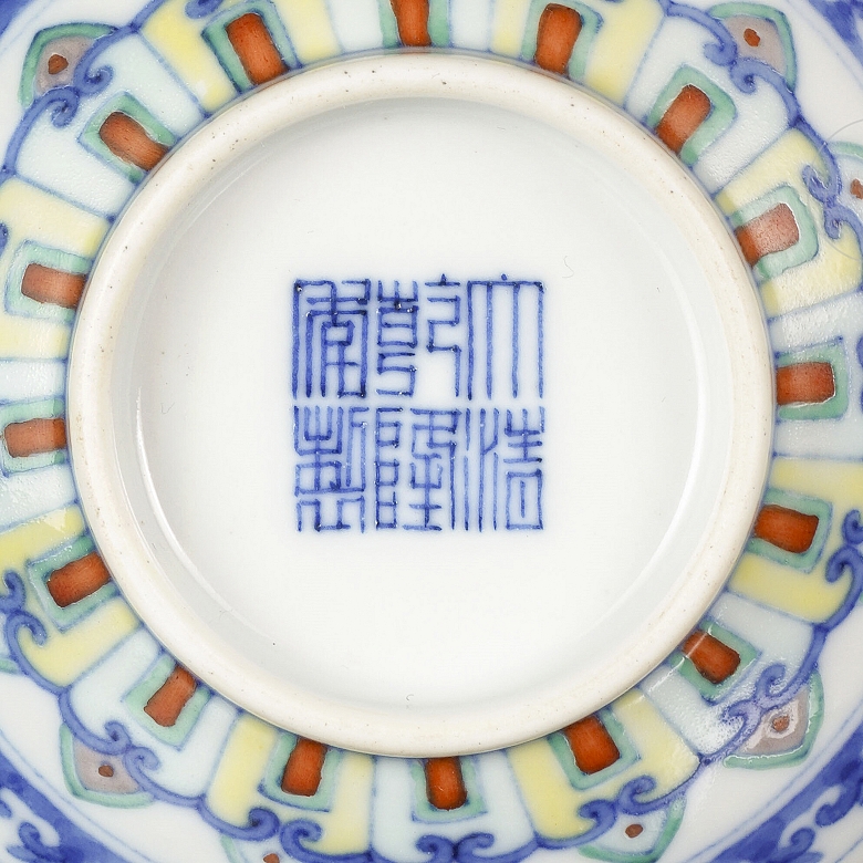 Porcelain bowl with doucai enamels, ‘Flowers’, with Qianlong seal