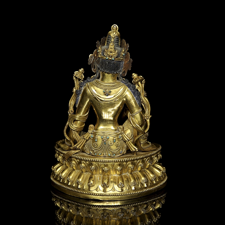 Figura de bronce dorado 