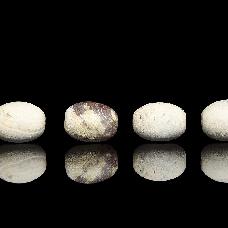 Four large carved stone beads, Qing dynasty