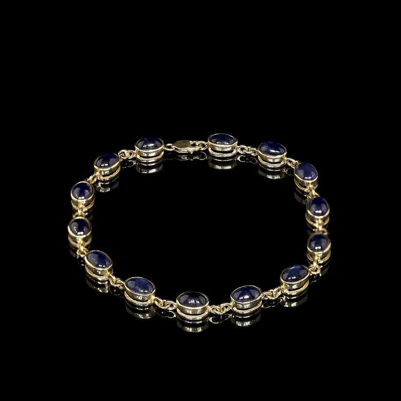 Pulsera de oro amarillo con zafiros