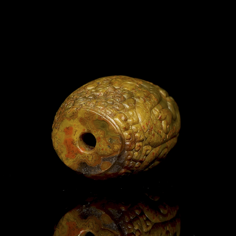 Cuenta de ágata tallada