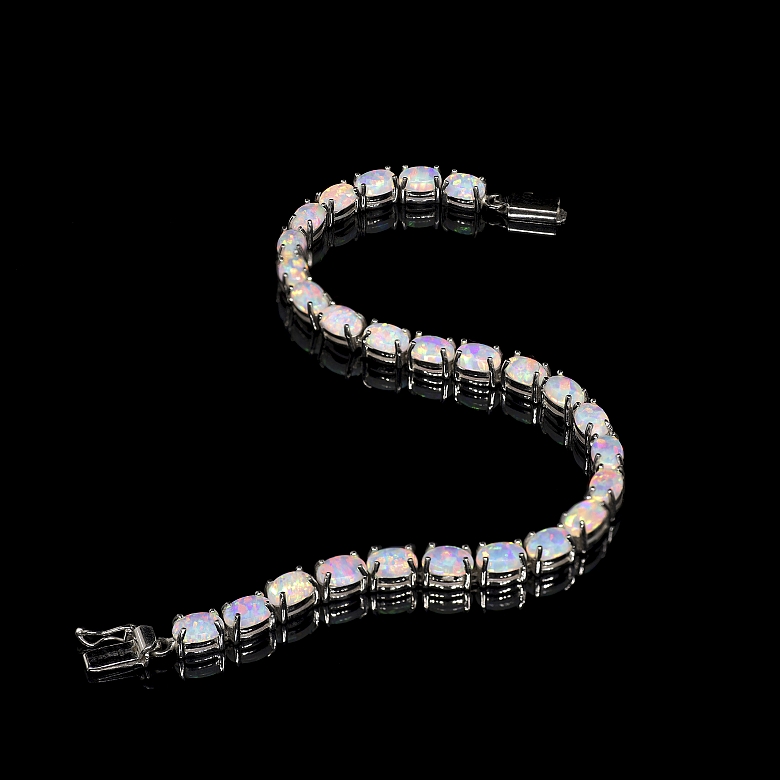 Pulsera de oro blanco con ópalos