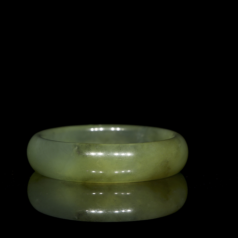 Circular carved jade bangle, 20th century