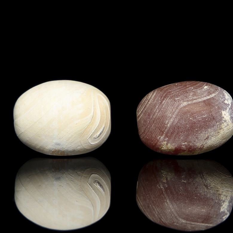 Four large carved stone beads, Qing dynasty