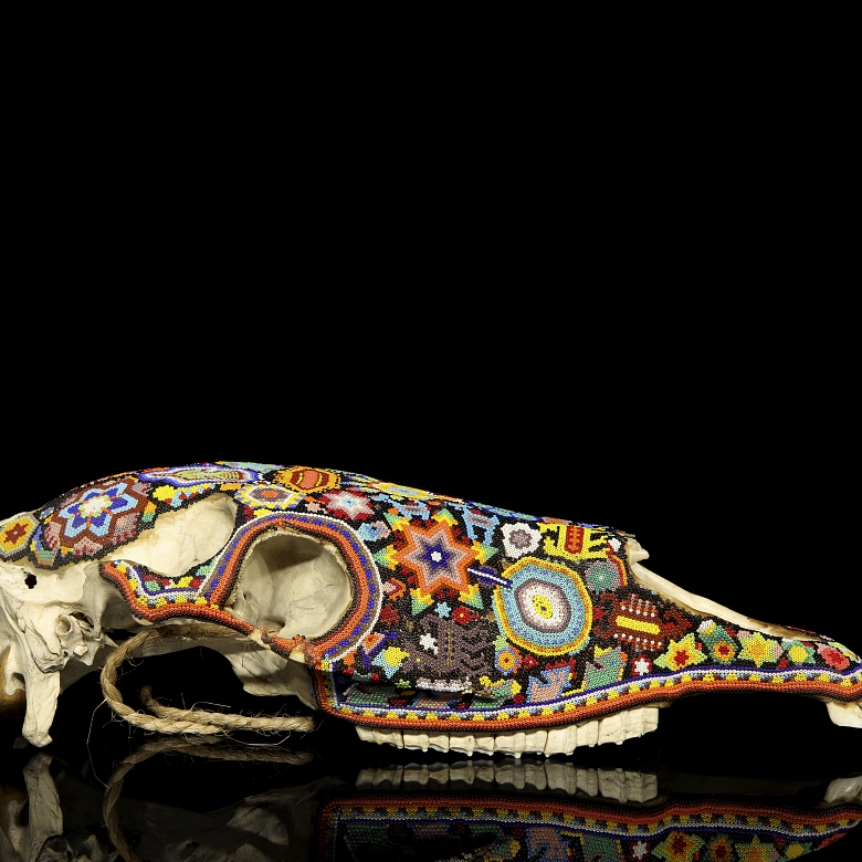 Skull decorated with beads, Huichol culture, Mexico, 20th century