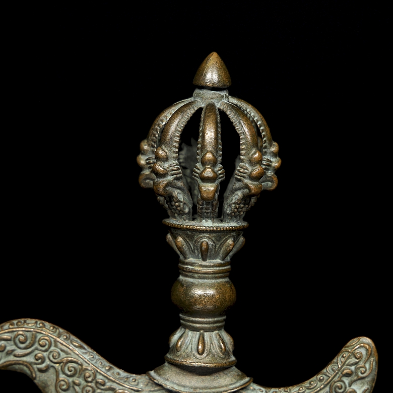 Elemento de ritual de bronce