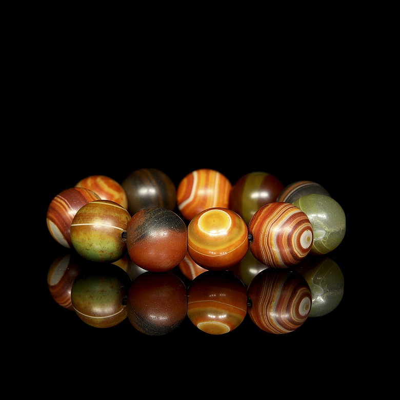 Antigua pulsera de once cuentas de ágata