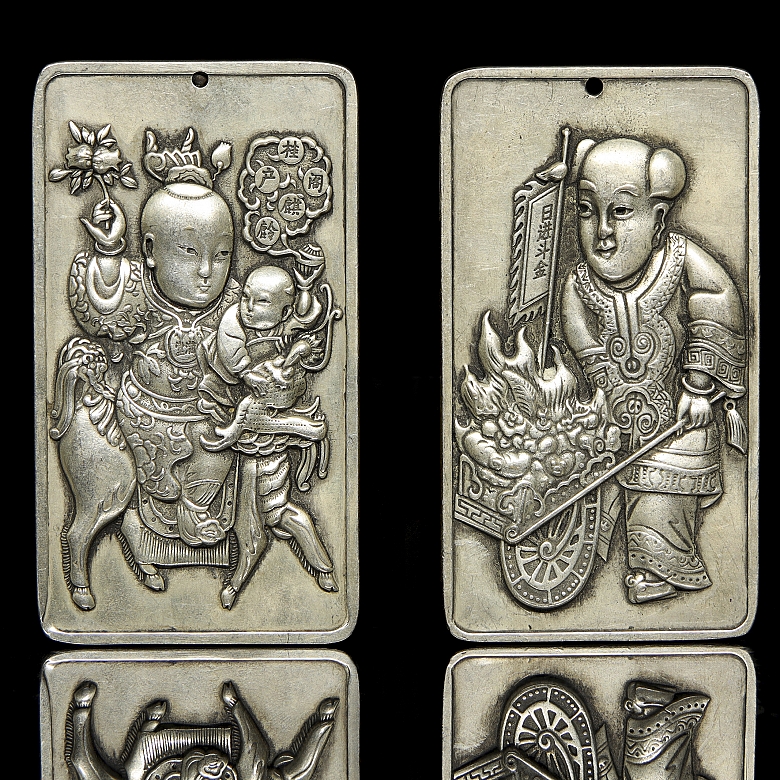 Pair of silver metal plaques, ‘Characters’, 20th century