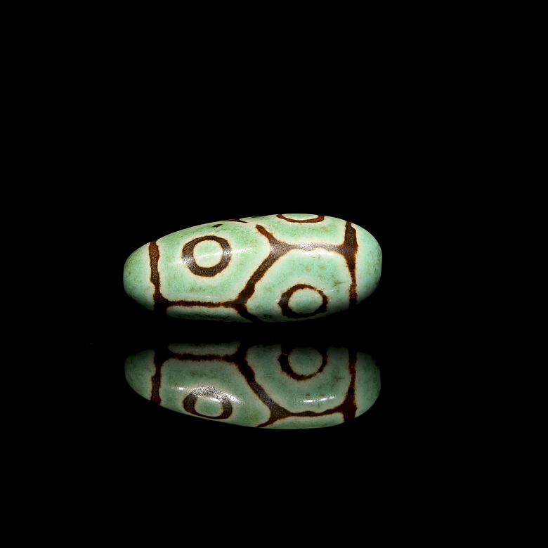 Cuenta Dzi de piedra tallada