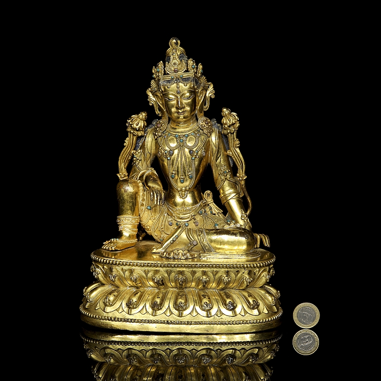 Figura de bronce dorado 