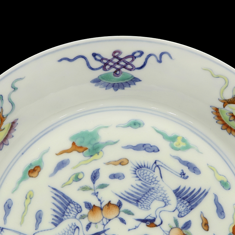 Glazed porcelain plate ‘Buddhist Emblems’, with Yongzheng mark