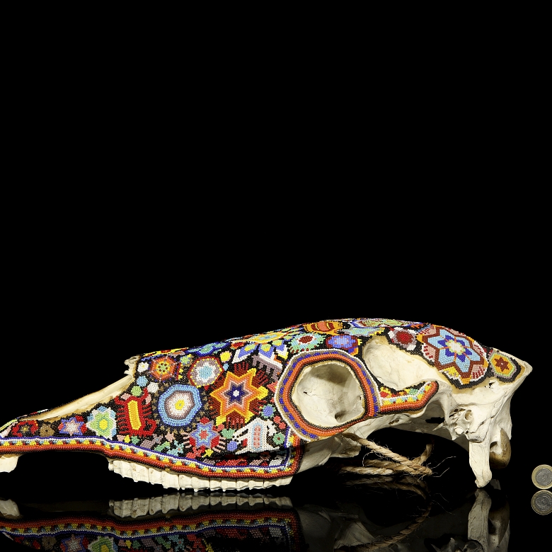 Skull decorated with beads, Huichol culture, Mexico, 20th century