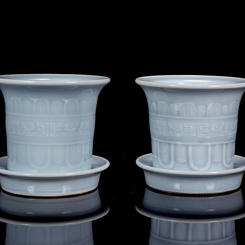 Pair of porcelain flower pots with sky blue glaze, marked Qianglong