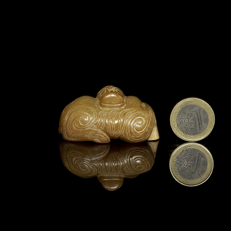 Figura de jade amarillo