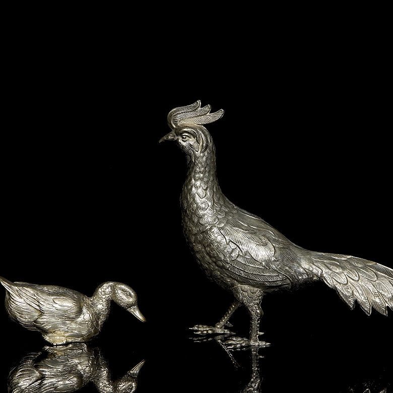 Dos figuras de plata 