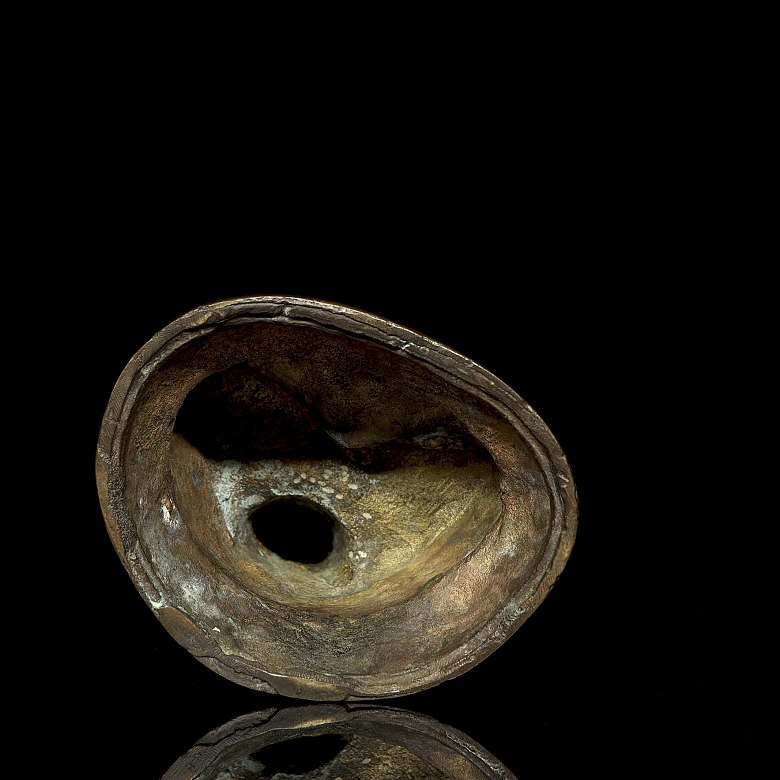 Figura de bronce