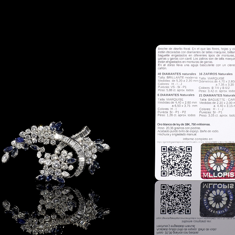 Broche con zafiros y diamantes en oro blanco de 18 kt