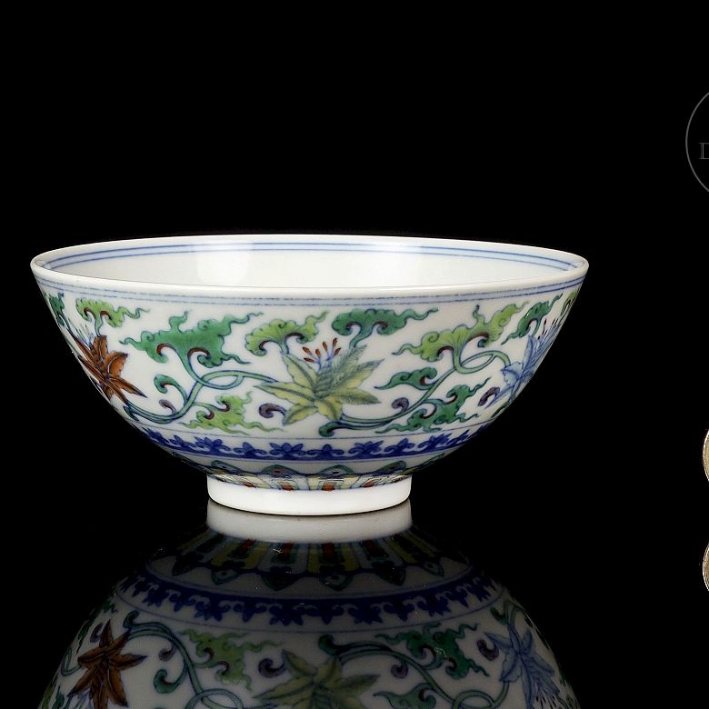 Porcelain bowl with doucai enamels, ‘Flowers’, with Qianlong seal