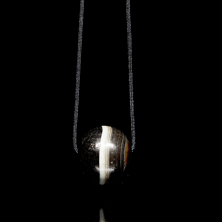 Spherical ‘Dzi’ bead carved from agate, Tang dynasty