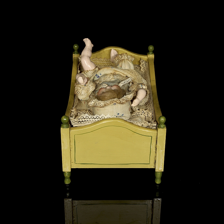 Muñeca autómata de porcelana con cuna, Alemania/Francia, c. 1890-1910