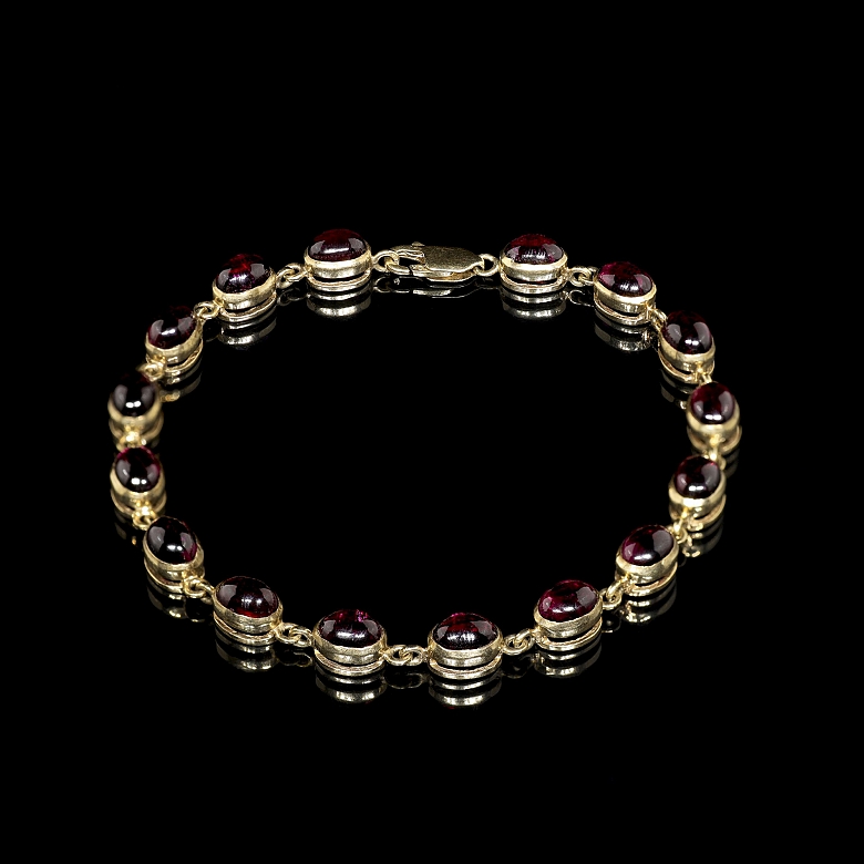 Pulsera de oro amarillo con gemas