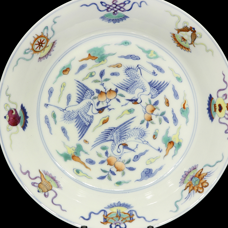 Glazed porcelain plate ‘Buddhist Emblems’, with Yongzheng mark