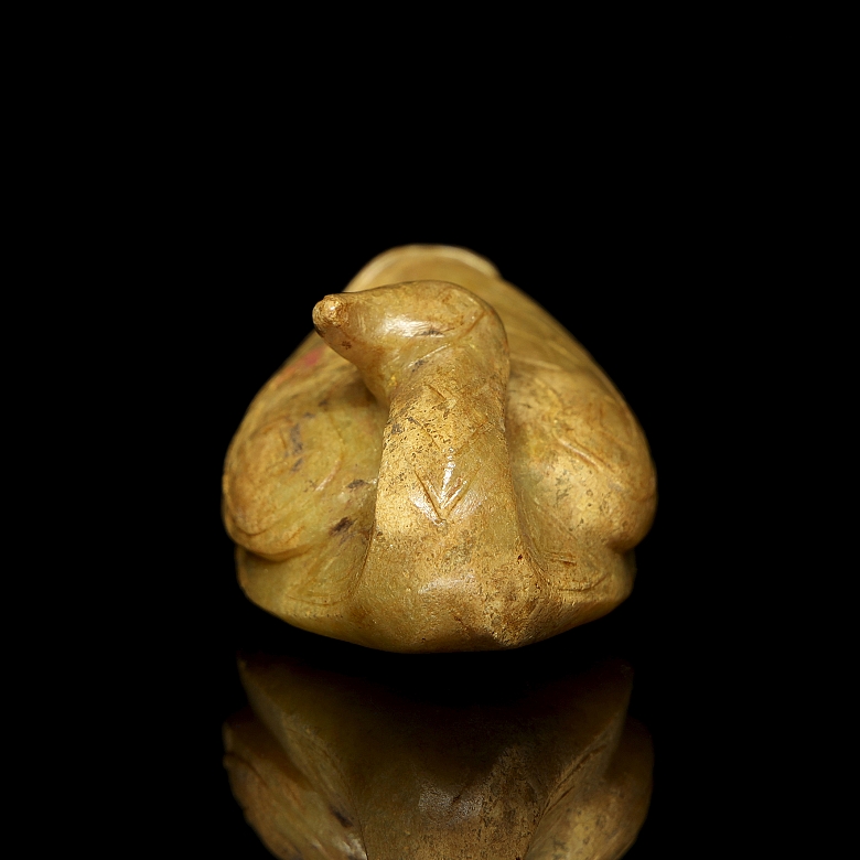 Figura de jade amarillo