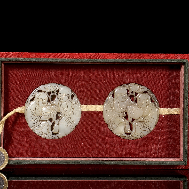 Pair of white jade pendants, ‘Characters with lotus’, Qing dynasty