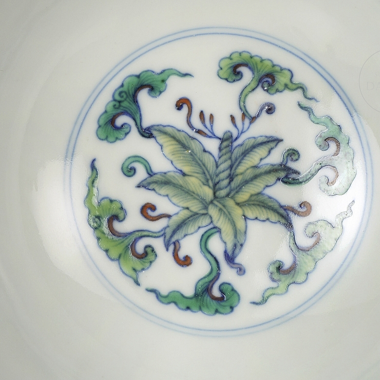 Porcelain bowl with doucai enamels, ‘Flowers’, with Qianlong seal
