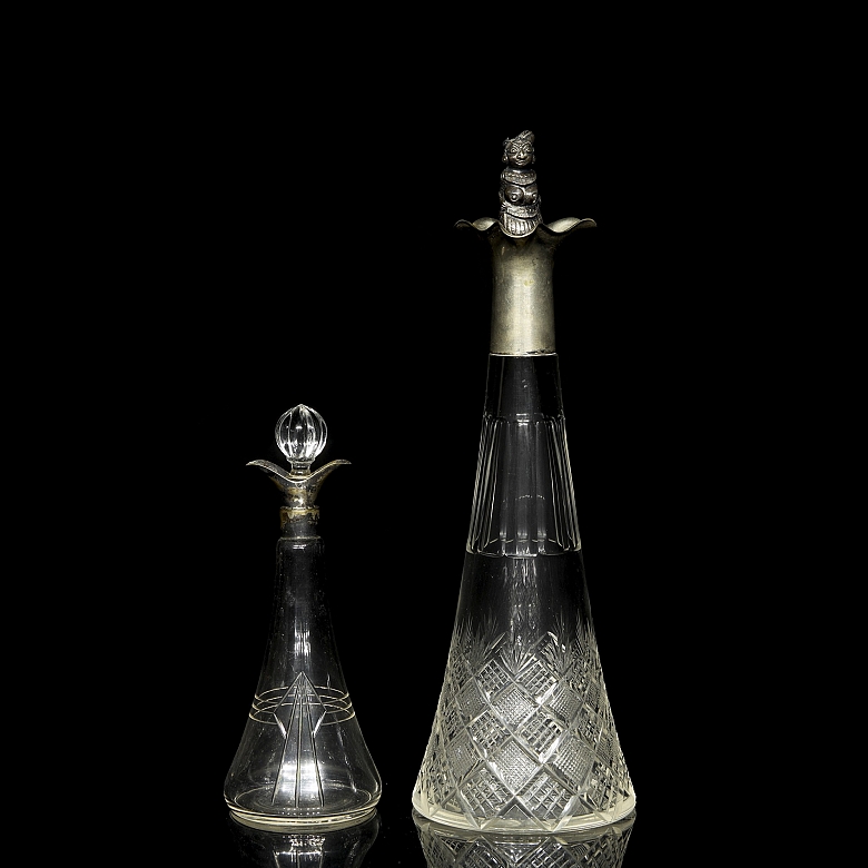 Pair of carved glass jugs, 19th century