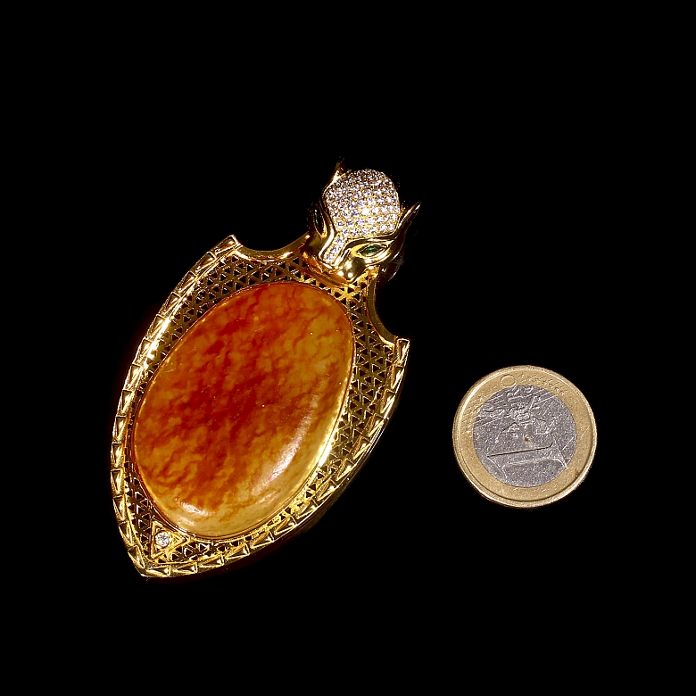 Gold-plated silver and Hetian jade pendant “Feline,” Qing dynasty