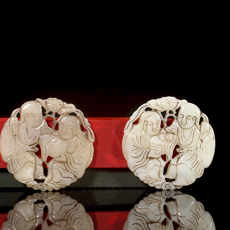 Pair of white jade pendants, ‘Characters with lotus’, Qing dynasty