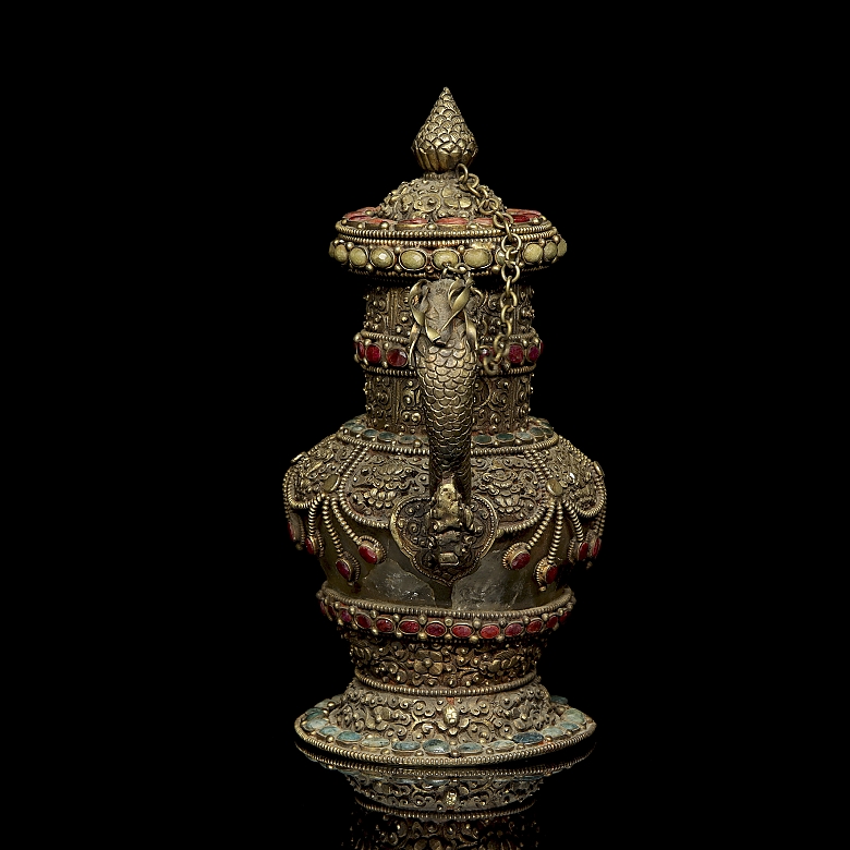Tetera de bronce dorado y piedras