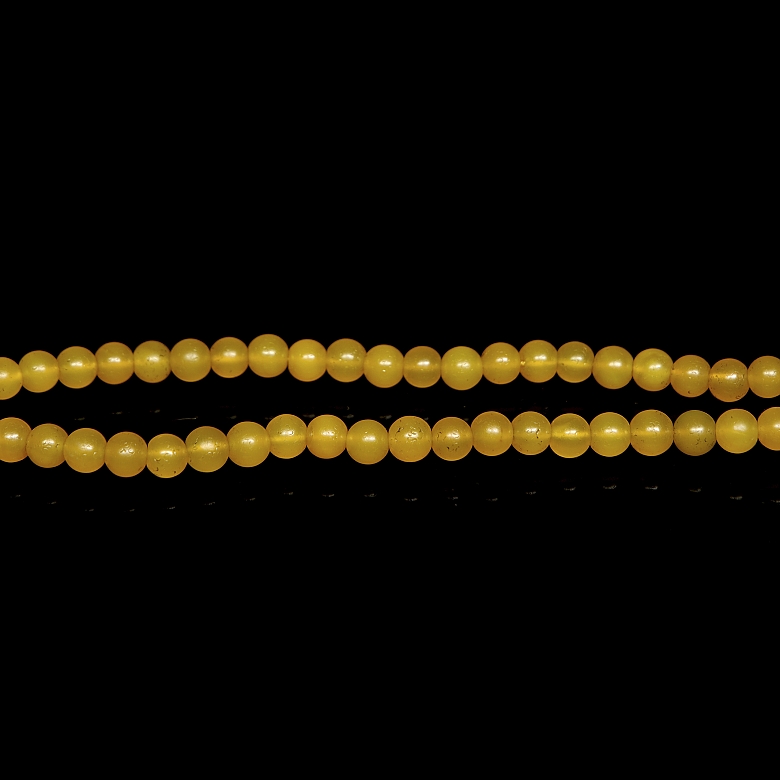 Collar de ciento ocho cuentas de ágata amarilla, dinastía Yuan