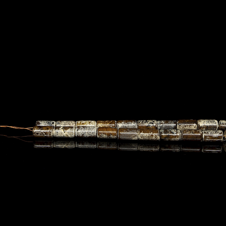 Necklace with twenty carved stone beads, Han style.