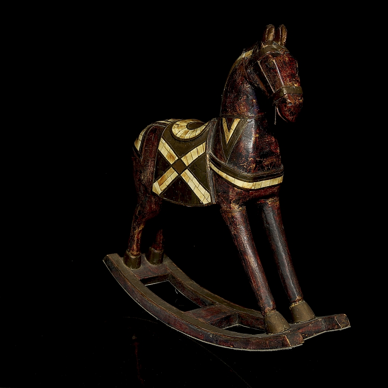 Caballo balancín de madera tallada, s.XX