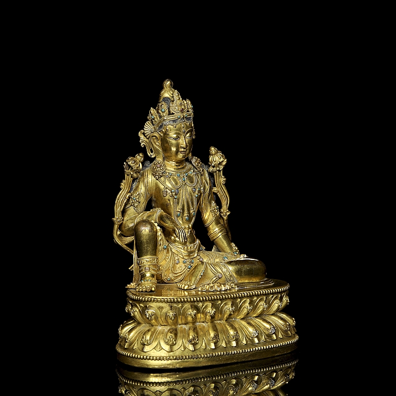 Figura de bronce dorado 