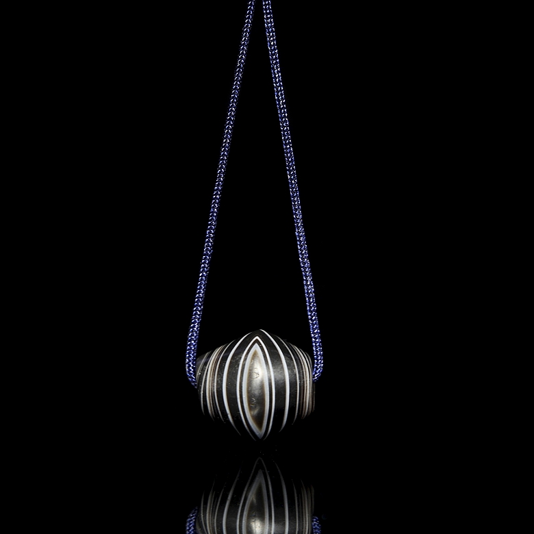 Ancient carved black agate bead