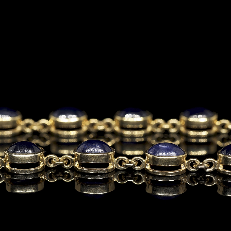 Pulsera de oro amarillo con zafiros