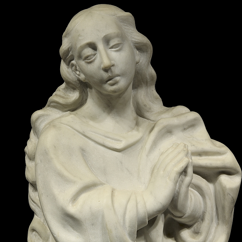 Busto de mármol tallado