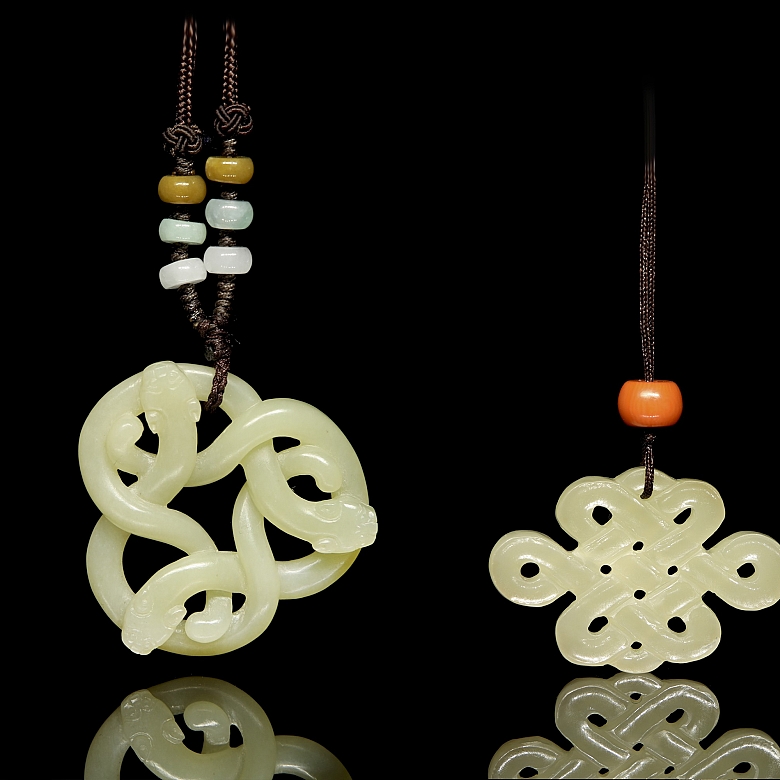 Two carved jade pendants, 20th century