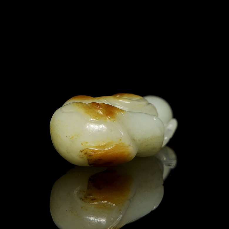 Carved jade figure, ‘Figure with Branch,’ Qing dynasty